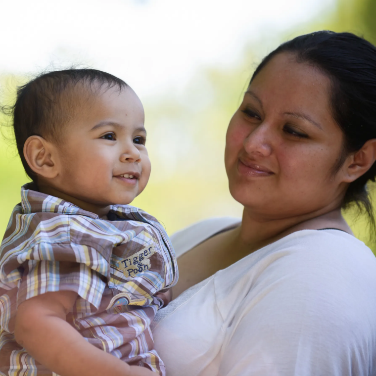 Hispanic-woman-holding-her-baby-boy