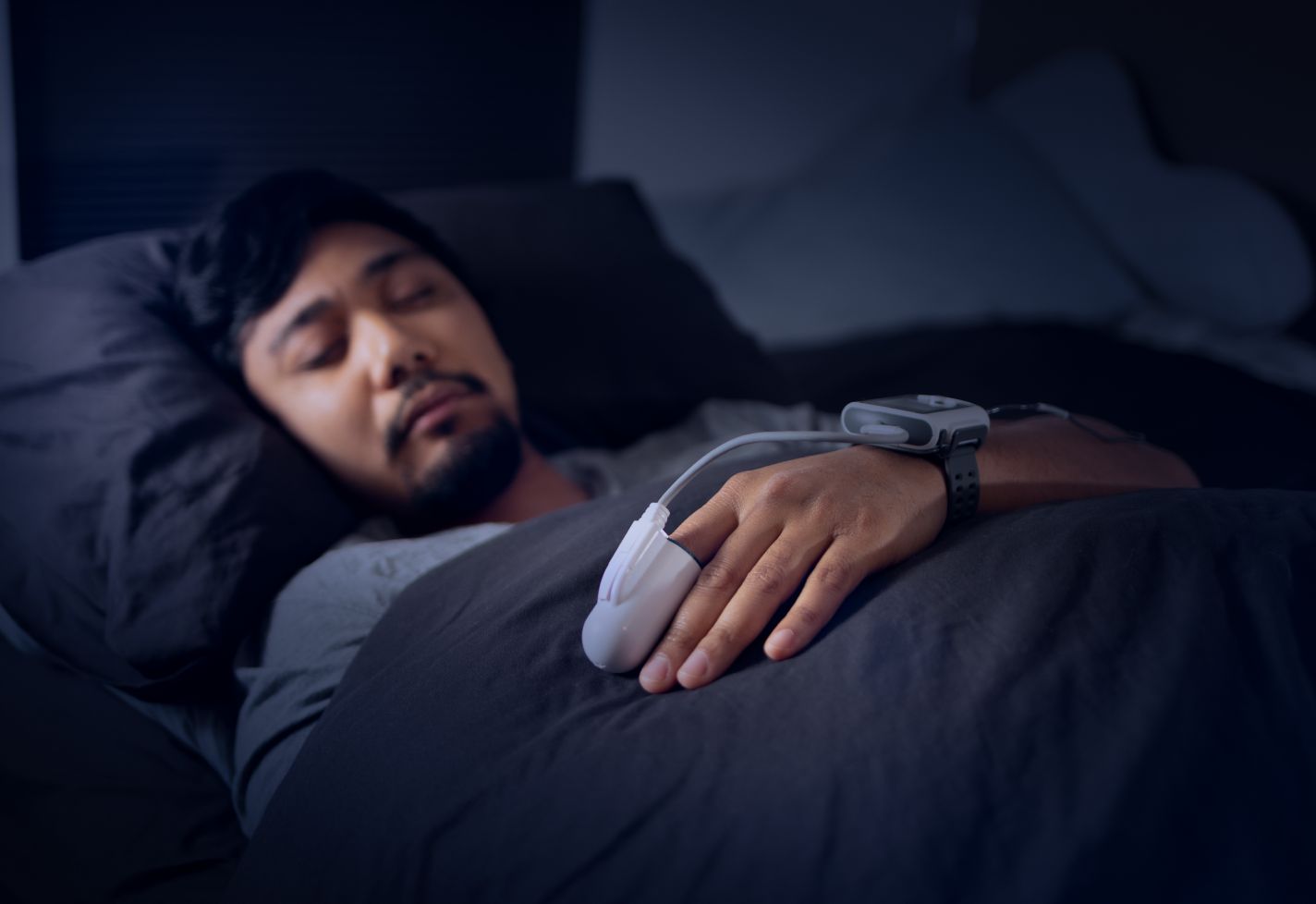 man adults sleep night monitor