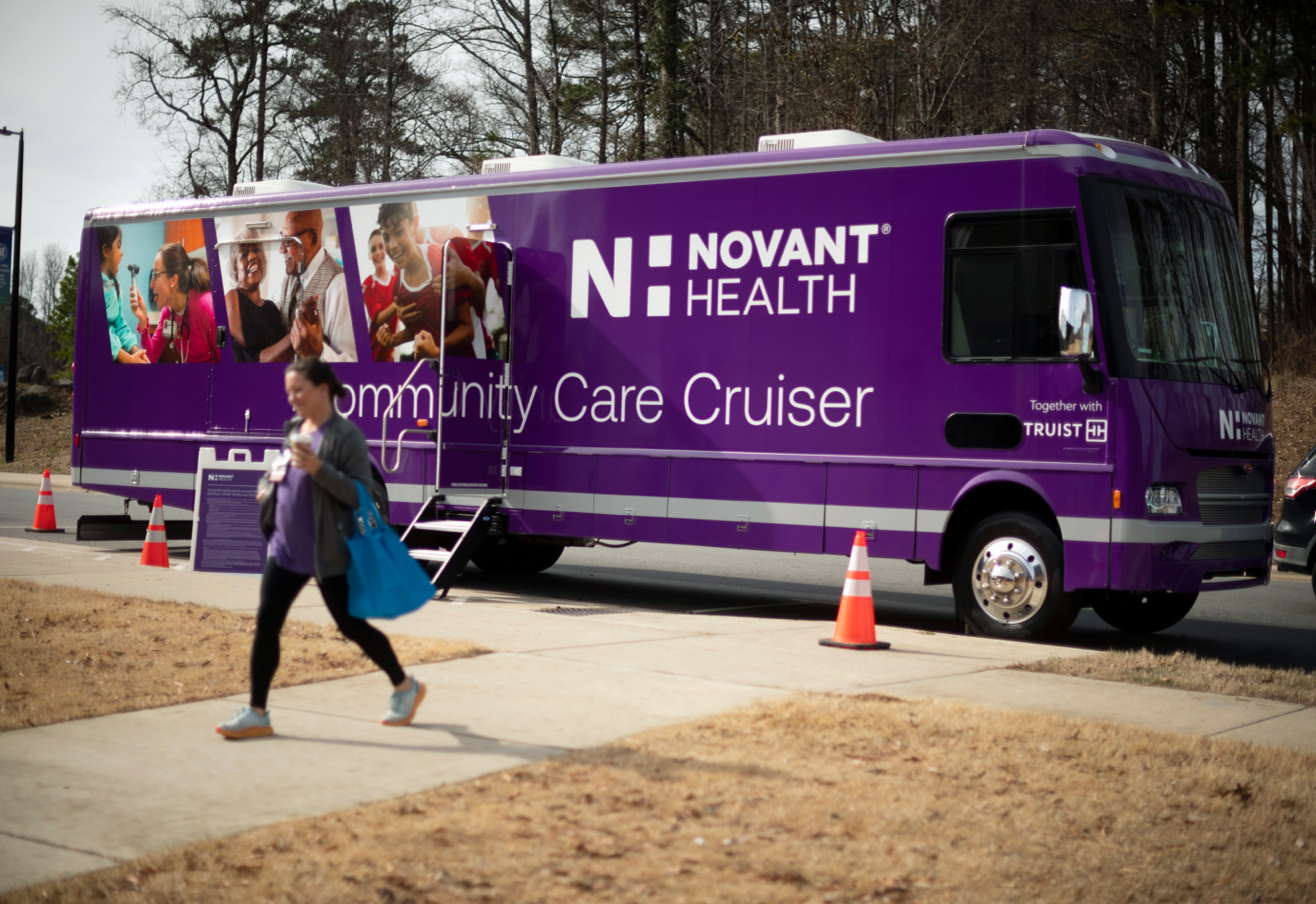 A woman leaving the Novant Health Community Cruiser.
