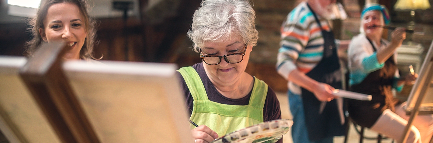 Senior woman painting