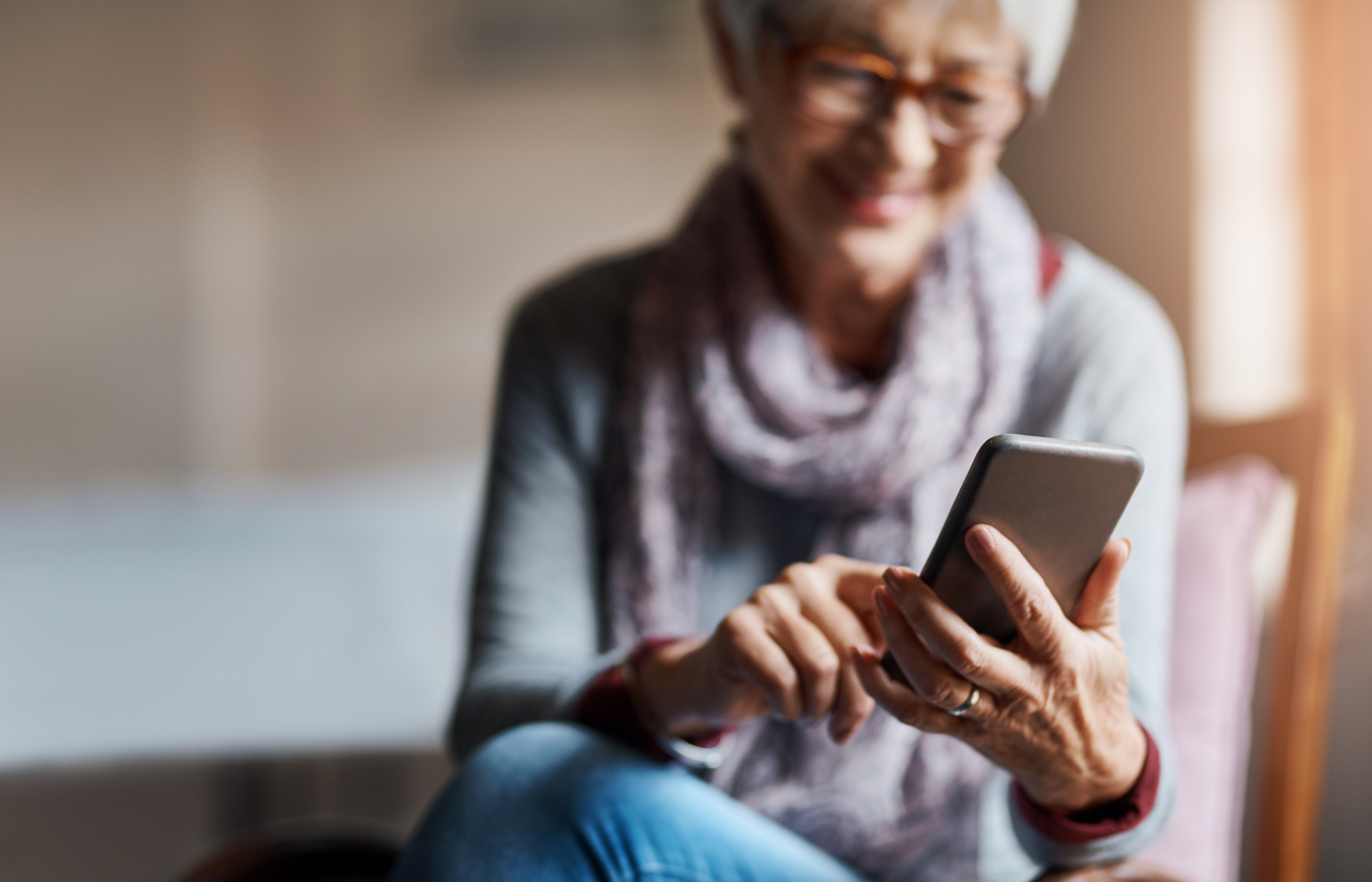 Senior woman using her smartphone