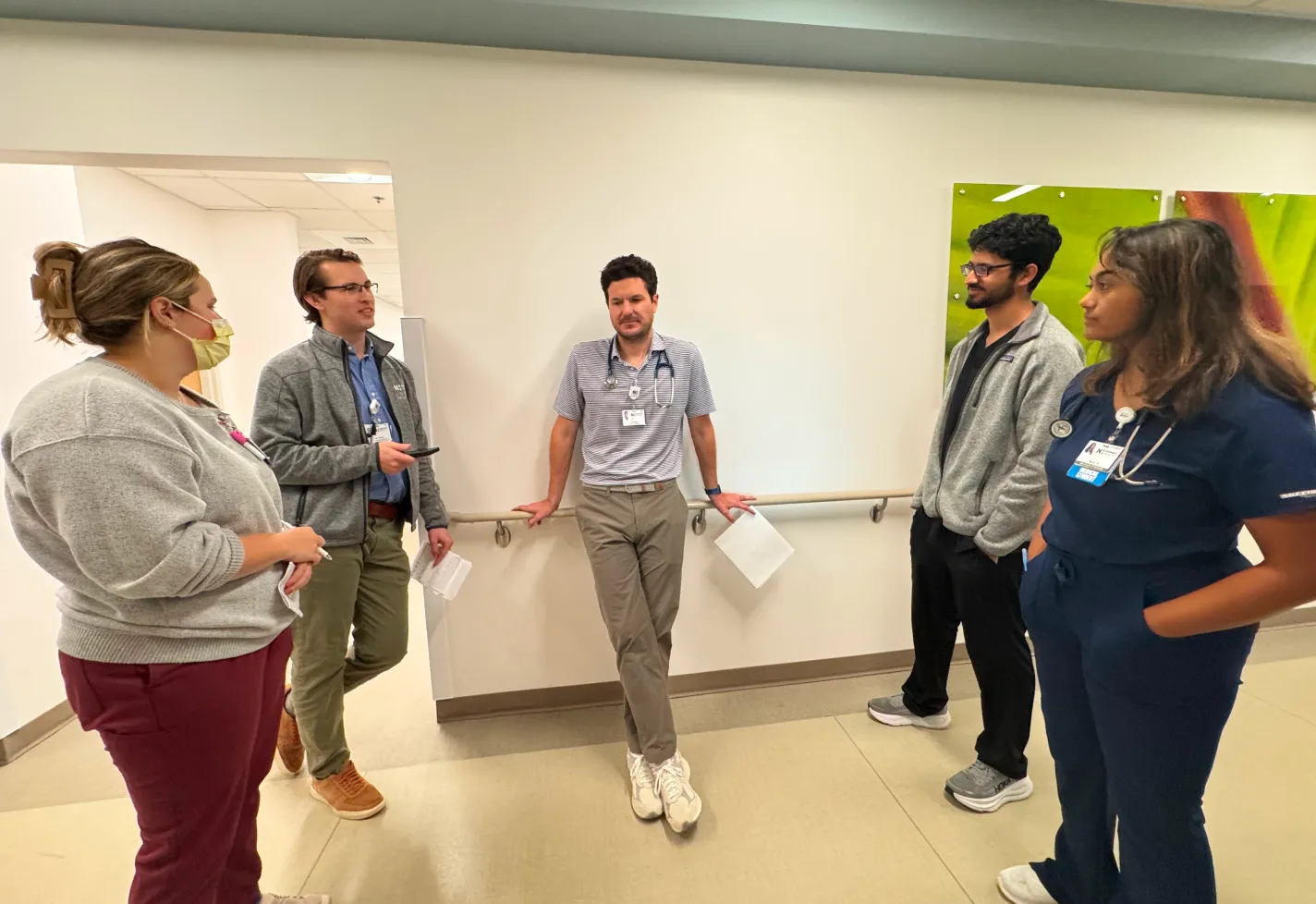 Wilmington, NC internal medicine residents talking in a hallway
