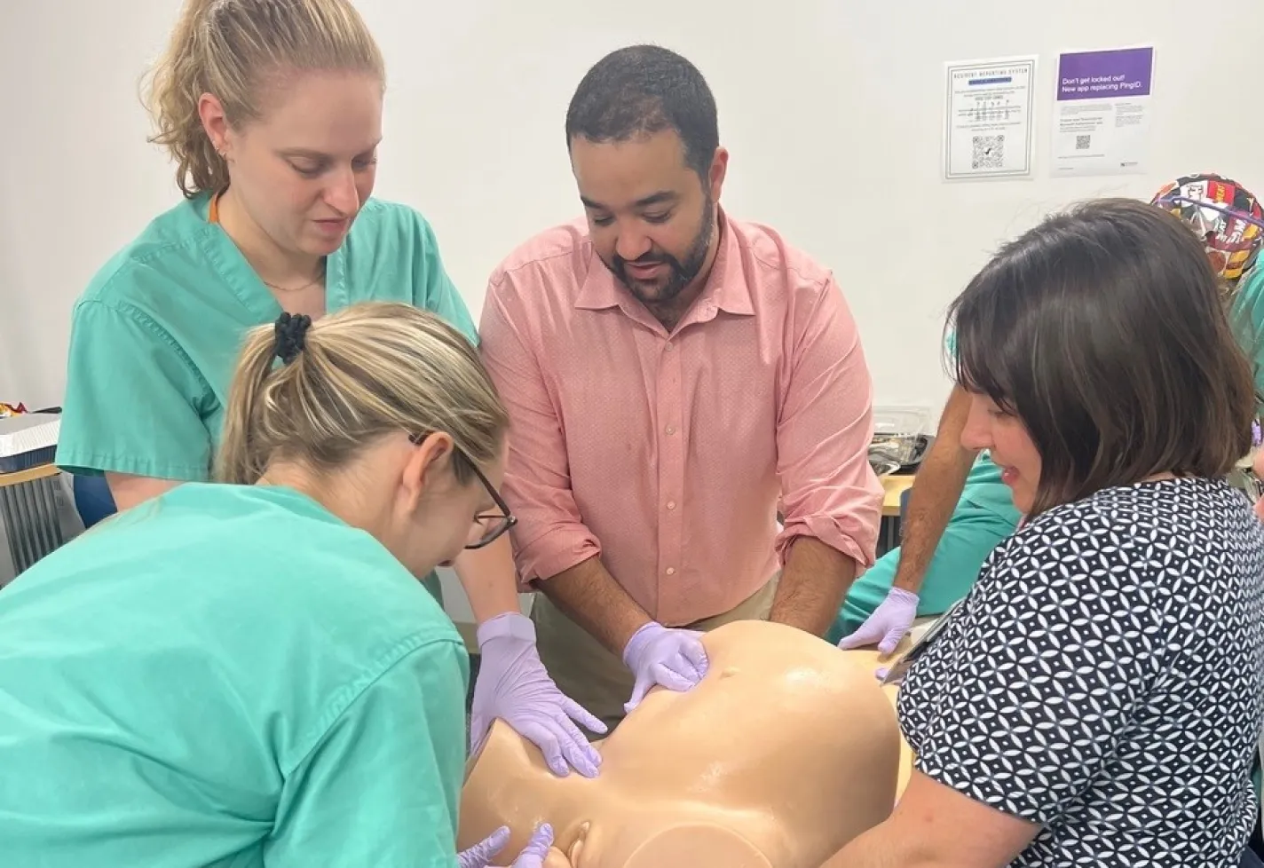 Wilmington, NC ob-gyn residents in birthing demonstration lab