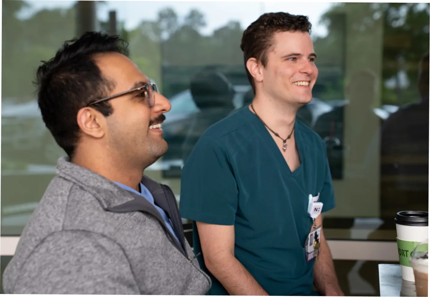 Wilmington, NC psychiatry residency resident and faculty talking over coffee