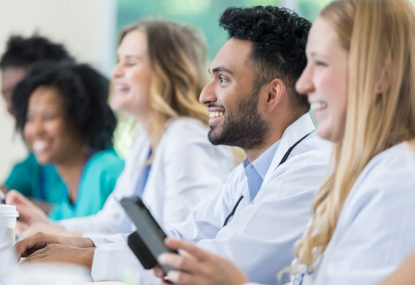 Medical residents students taking class in classroom