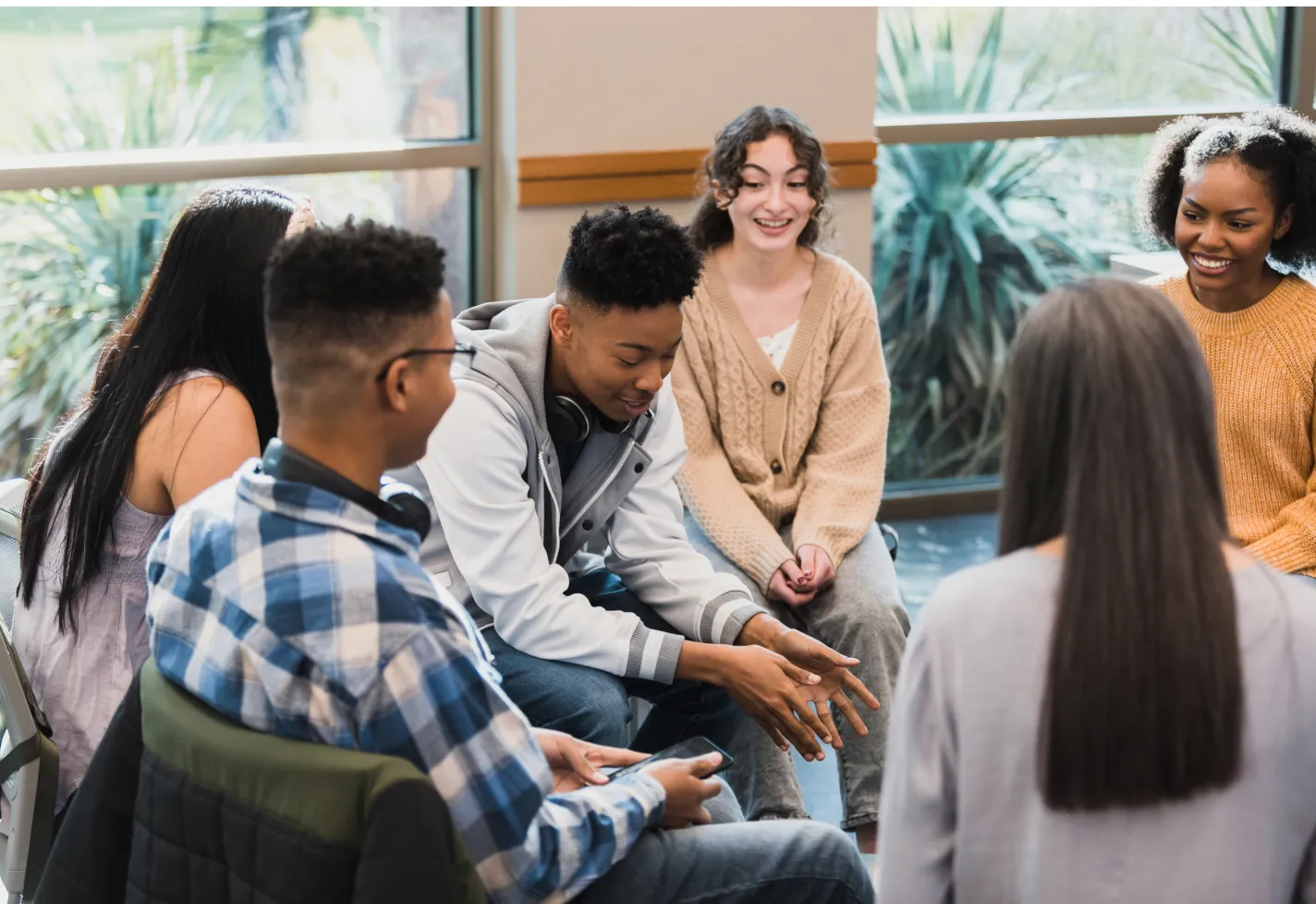 Boy talking in a mental health support group Boy talking in a mental health support group