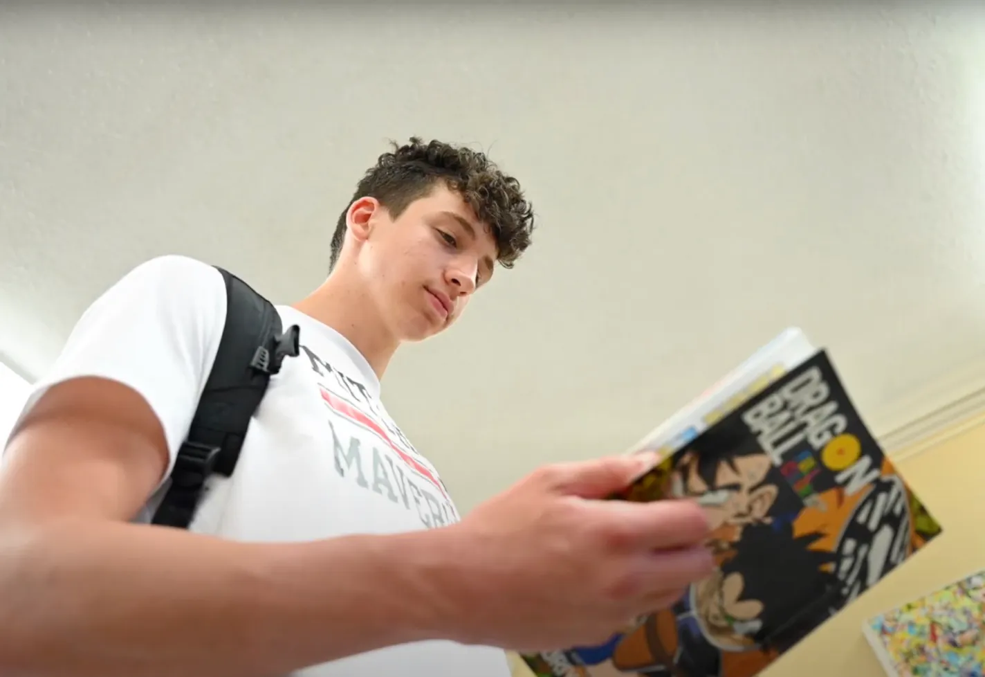 Patient, Nicholas Friedman, reading a book. Patient, Nicholas Friedman, reading a book.