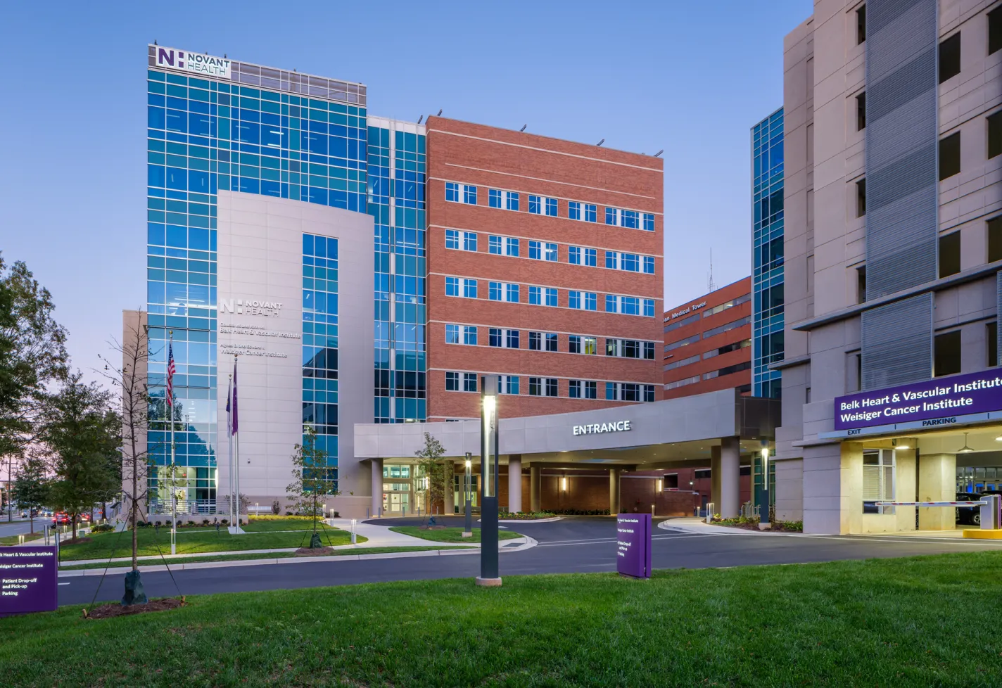 The front and parking garage entrance of Novant Health Belk Heart & Vascular Institute and Novant Health Weisinger Cancer Institute 