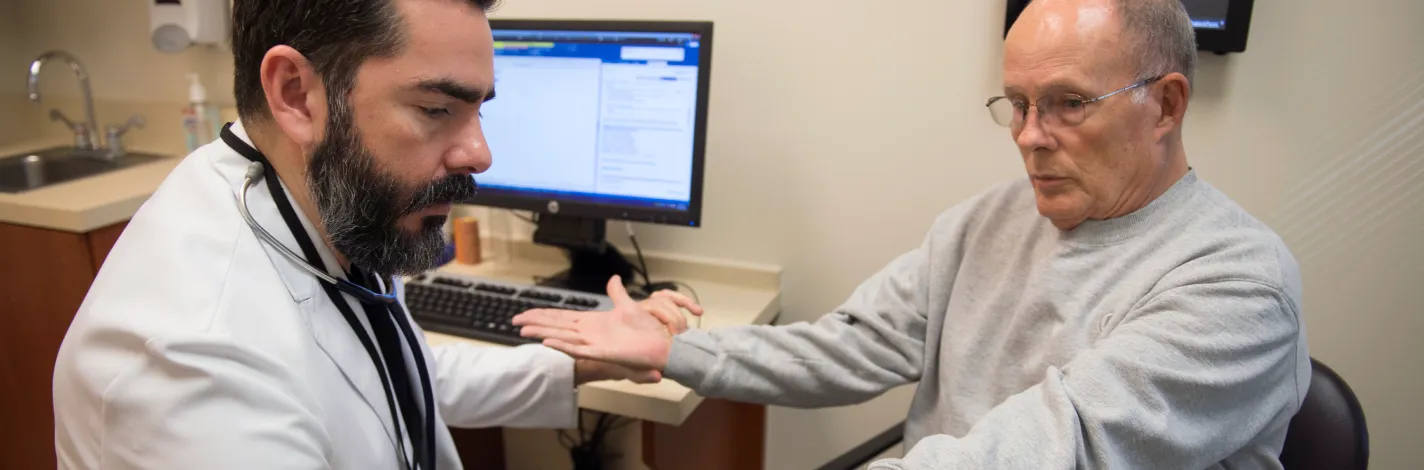 Physician examining a patient. 