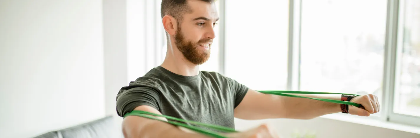 thin male with exercise band