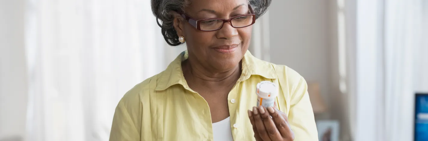 senior woman with medication