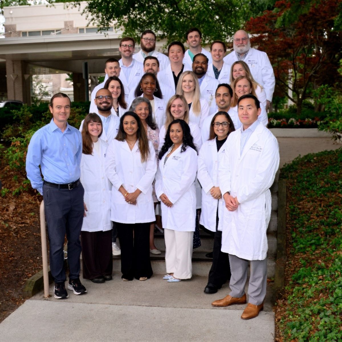 Group of Novant Health NHRMC internal residents in their white coats